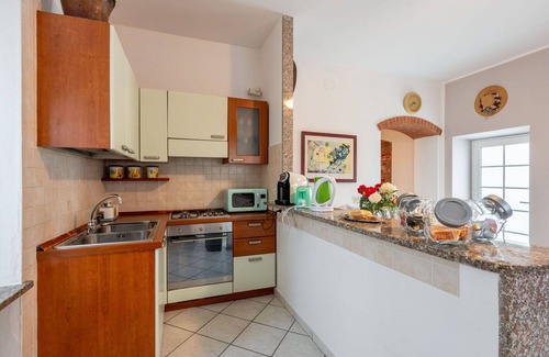 Castell'Alfero Apartment | Lovely apartment for 4 guests with WIFI, pool, TV, patio and parking
