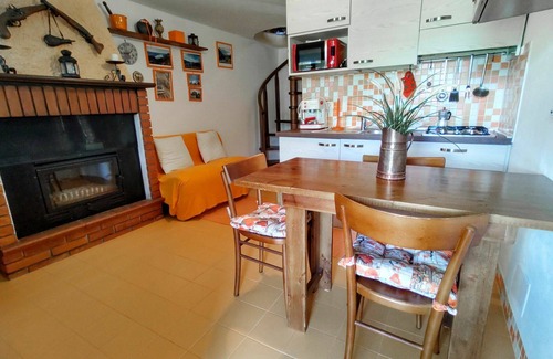 Peglio Apartment | Lovely apartment for 6 guests with WIFI, TV, patio, pets allowed and parking