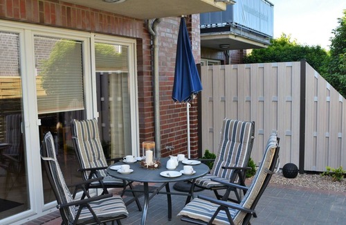 Norddeich Apartment | Lovely apartment for 4 guests with WIFI, TV, terrace and parking
