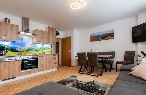 Taxenbach Apartment | Lovely apartment for 4 guests with WIFI, TV, balcony, panoramic view and parking