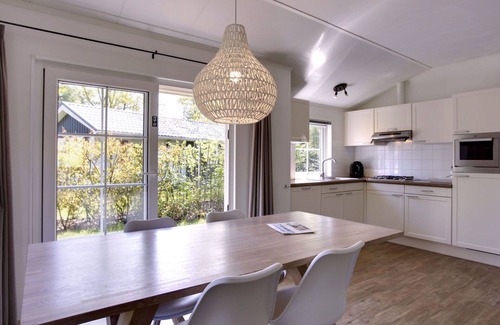 Municipality of Dalfsen House | Lovely apartment in villa for 4 people with WIFI, pool, TV, terrace and parking
