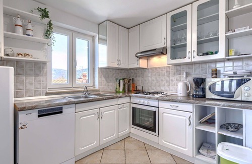 Krsan Villa | Lovely apartment in villa for 6 people with WIFI, pool, A/C, TV, patio, pets allowed and parking