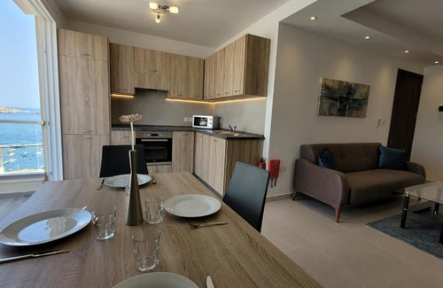 Bugibba Apartment | Lovely Apartment with Side Sea View
