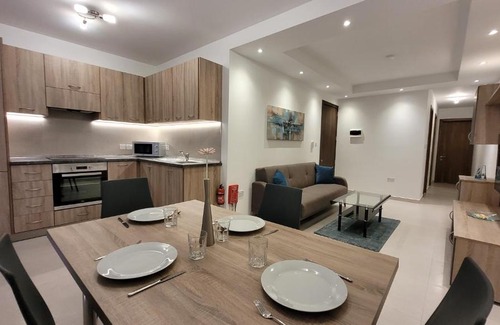Bugibba Apartment | Lovely Apartment with Side Sea View