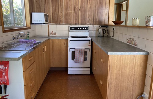 Tomakin House | Lovely beach cottage - 5 minute easy walk to beach