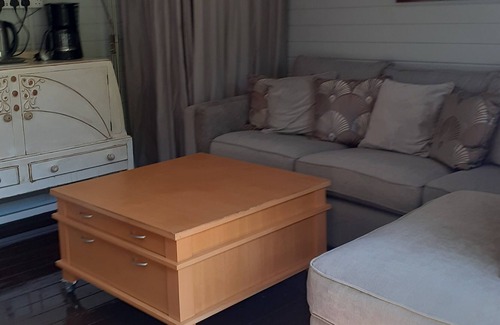 Hastings Cabin | Lovely Cabin set in a Beautiful Garden. Short Walk Into Town. Dogs Welcome