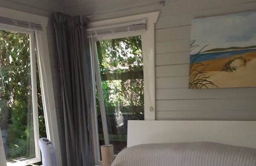 Hastings Cabin | Lovely Cabin set in a Beautiful Garden. Short Walk Into Town. Dogs Welcome