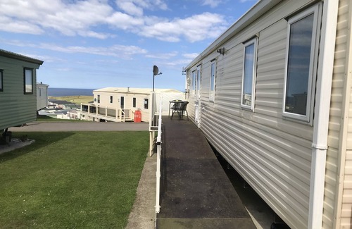 Flamborough House | Lovely caravan holiday home in a beautiful coastal setting.