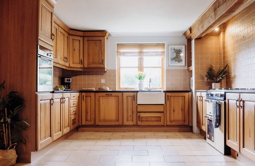 Devils Bridge House | Lovely countryside farm house with large hot tub and disabled friendly. Sleeping 12