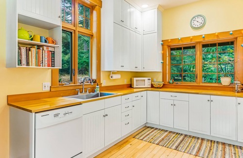 Rosario House | Lovely Orcas Island craftsman-style home in a serene setting with inviting deck