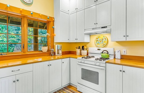 Rosario House | Lovely Orcas Island craftsman-style home in a serene setting with inviting deck