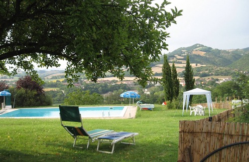 Cagli Apartment | lovely panorama, pool and valley view, equipped with kitchenette.
