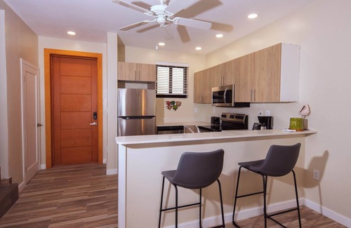 Leeward Settlement Apartment | Lush 2-Story Villa, Poolside Bliss Near Beach