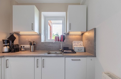 Osterhusum Apartment | Lütte Eck vacation apartment in Husum for up to 2 people