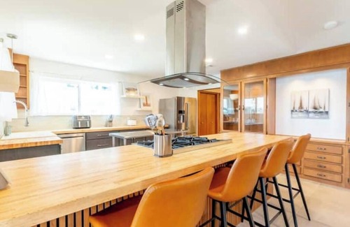 Ono Island Villa | Lux Waterfront Oasis w/Private Dock, Kayaks, Blackstone Grill, and Fire Pit