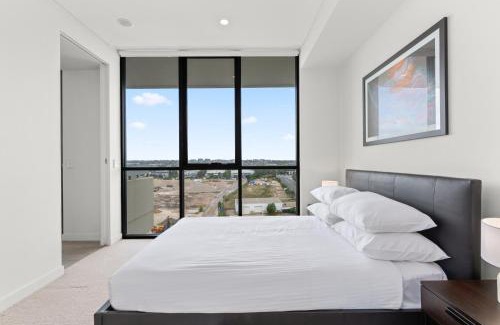 Lidcombe Apartment | Luxe 2-Bed: Modern Interiors Balcony & BBQ Area