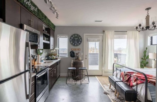 The Nations Apartment | Luxe Apartment with Private Deck in Nashville