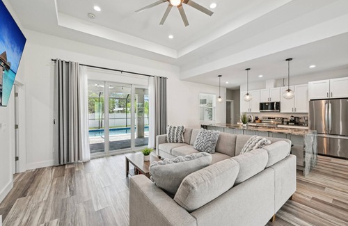 North Port House | 🌟 🆕 Luxe Gem w Heated Saltwater Pool, Spa & Privacy Fence.