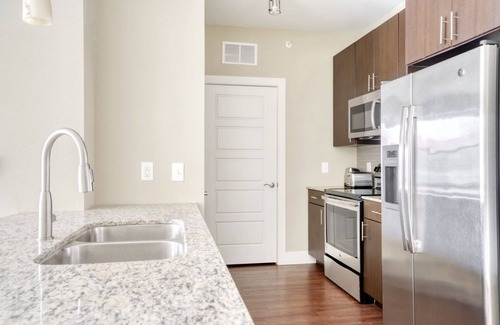 Mueller Apartment | Luxe Mueller Studio w/Pool, W/D & Gym, nr park, by Blueground