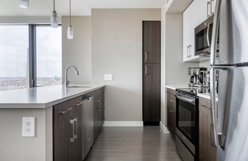 West End Apartment | Luxe North Station 2BR w/Gym & W/D, walk to T & Shops, by Blueground