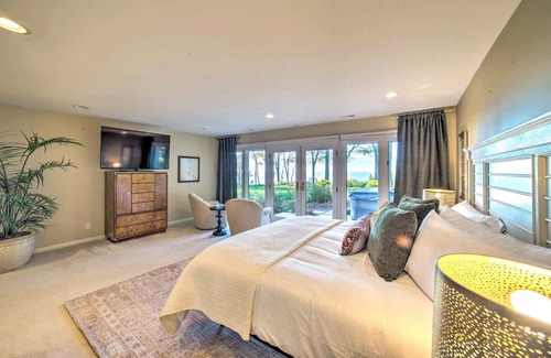 Riverside House | Luxe Waterfront Haven: Private Beach, Hot Tub