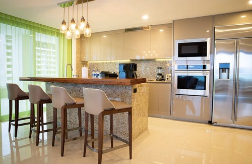 Puerto Juarez Resort | Luxurious 3 Bedroom Oceanfront Suite right on the beach of Cancun!
