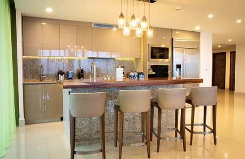 Puerto Juarez Resort | Luxurious 3 Bedroom Oceanfront Suite right on the beach of Cancun!