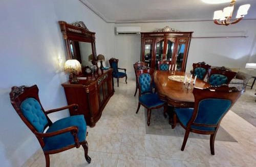 Al Rehab Apartment | Luxurious 3 BR Rustic Apartment Overlooking Huge Garden - For Families and Couples