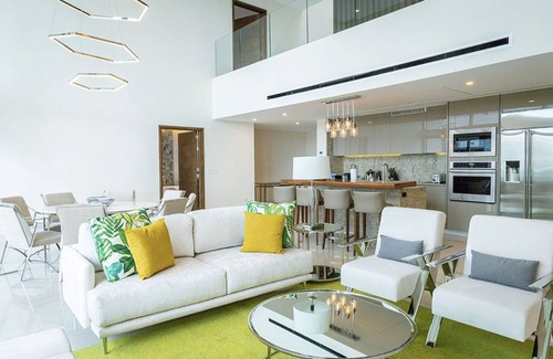 Puerto Juarez Resort | Luxurious 4 Bedroom Penthouse Loft right on the beach of Cancun!