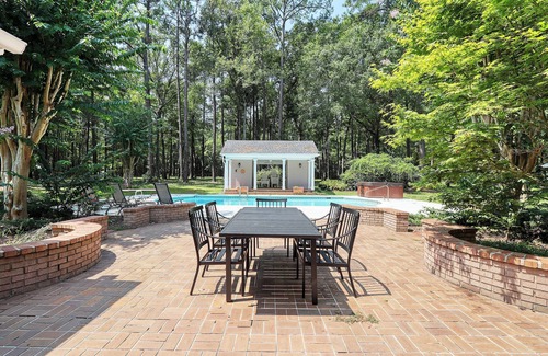 Thomasville House | Luxurious 4-Bedroom Retreat with Theater, Pool, Hot Tub, and Bar on 6 acres.