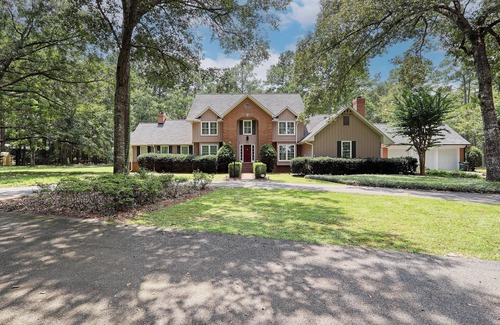 Thomasville House | Luxurious 4-Bedroom Retreat with Theater, Pool, Hot Tub, and Bar on 6 acres.