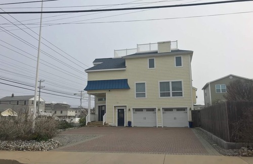 Beach Haven Crest House | Luxurious 6 Bedroom Oceanside Home with Pool. Steps from the Beach.