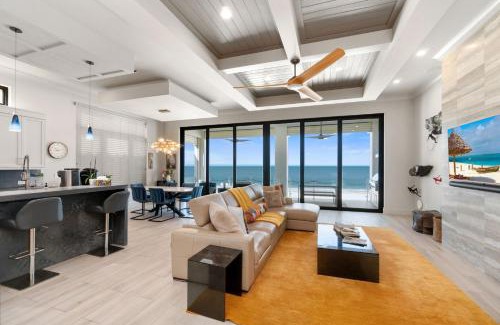 Mid Island House | Luxurious Beachfront Vacation Getaway, 4 Bedroom, 4 and half Bath w Heated Pool, Spa, Sleeps 12