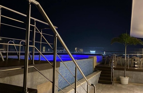 Ensanche Quisqueya Apartment | Luxurious Downtown Apt, Rooftop Pool, Gym