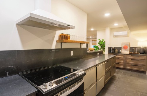 Beach Institute Apartment | Luxurious Garden-Level Retreat in Historic Savannah by Lucky Savannah