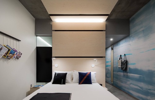 River North Art District Hotel | Luxurious King Room with Breathtaking Mountain Views and Modern Elegance