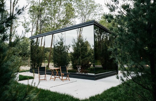 Pepin Cabin | Luxurious mirrored cabin nestled on the Woods & Co Weddings + Events property for the ultimate getaway