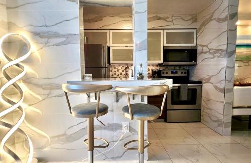 North Bay Village Apartment | Luxurious remodeled direct Waterfront apartment with Miami skyline view and outdoor terrace Free parking 5min drive to Miami Beach