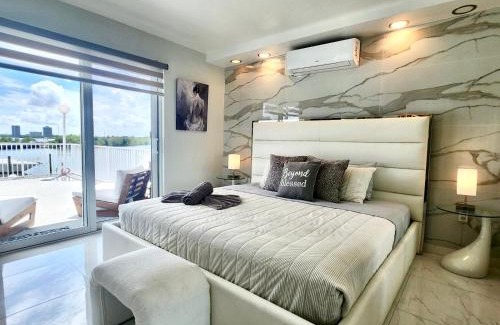 North Bay Village Apartment | Luxurious remodeled direct Waterfront apartment with Miami skyline view and outdoor terrace Free parking 5min drive to Miami Beach