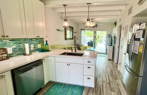 Key Colony Beach House | Luxurious Waterfront Oasis: 2BR, Private Heated Pool, Tiki, Dock
