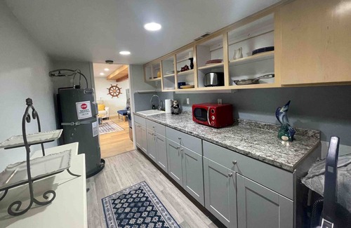 Hansville House | Luxurious water view home with private hot tub surrounded by wildlife