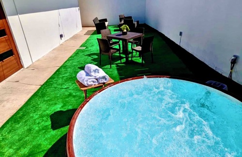 Arecibo Apartment | LuxuriousApt Private Jacuzzi/BBQ