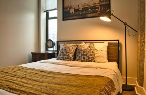 Near South Side Apartment | Luxury 3BR Spacious Suite Sleeps 8 Guests with Patio, Skyline View, Optional Parking and Gym Access Near McCormick Place and Lakefront