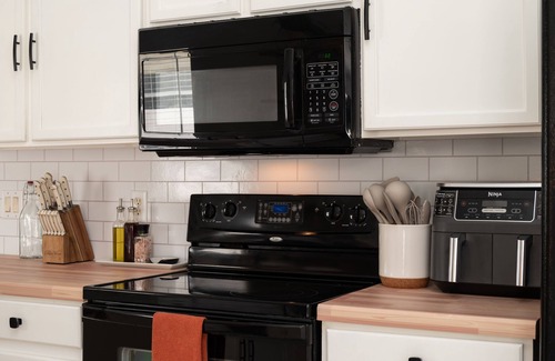 Indian Point House | Luxury 4 BD with fully-fenced + heated private pool! King Bed, Xbox + Game Room!