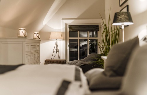 Loddin Resort | Luxury apartments with daily. Cleaning, fireplace, water views, laundry incl.