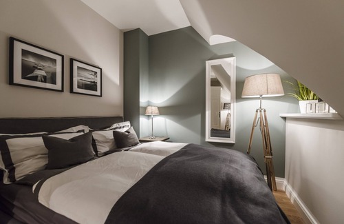 Loddin Resort | Luxury apartments with daily. Cleaning, fireplace, water views, laundry incl.