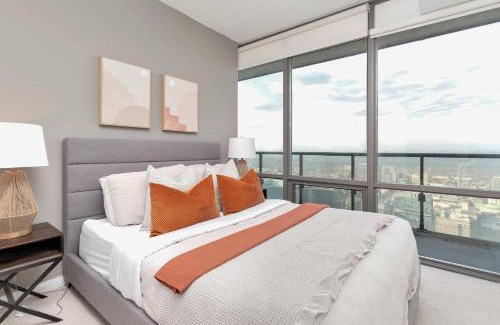 Bay Cloverhill Apartment | Luxury Bay Street Condo w Patio Sleeps 8