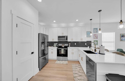 Jacksonville Beach House | Luxury Beach Home Sauna Cold Plunge E-bikes