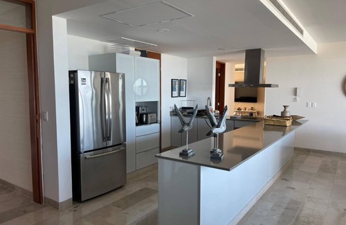 Telchac Puerto Condo | Luxury beachfront apartment with jacuzzi