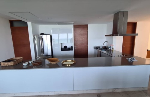 Telchac Puerto Condo | Luxury beachfront apartment with jacuzzi
